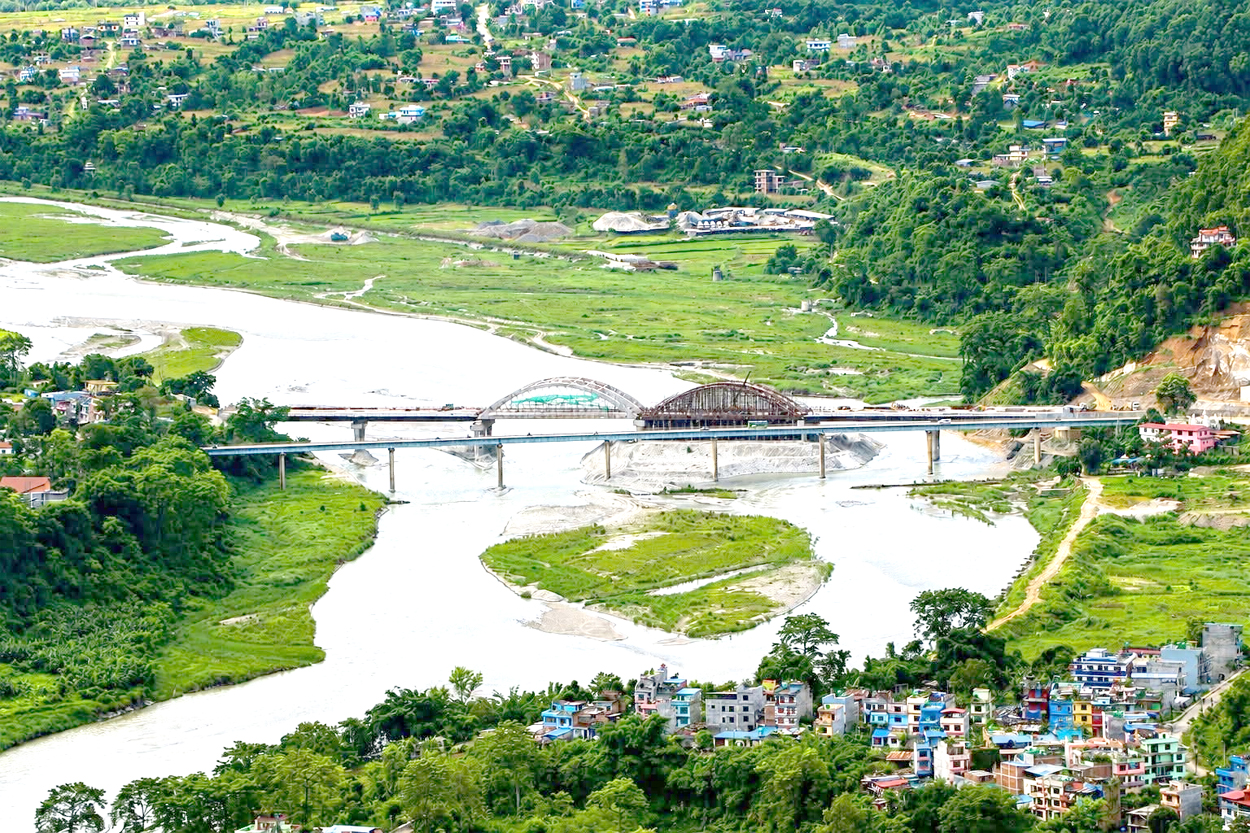 Photo of मादी नदीमा निर्माणाधिन चार लेनको पुल